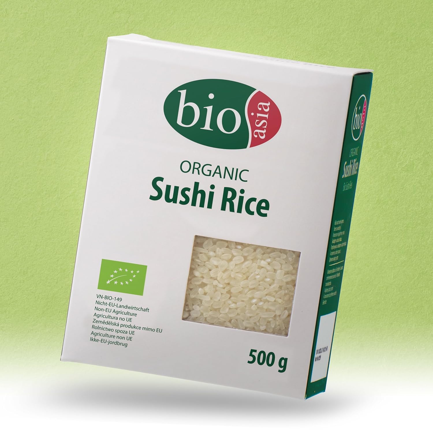 Nahaufnahme von gekochtem, leicht klebrigem BIOASIA Sushi Reis in einer Schale.